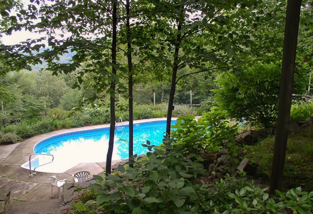 Woodland home and garden pool in Woodstock, NY